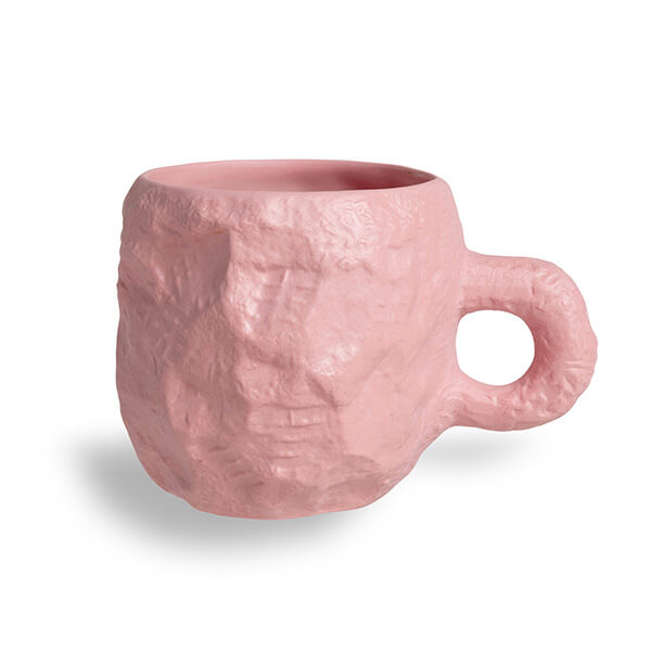 Crockery Pink Mug, is pink stained earthenware cast from a hand carved model, by 1882 Ltd. with Max Lamb
