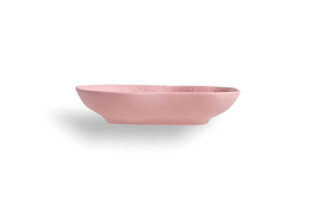 Small Platter_Crockery Pink_1882 Ltd. with Max Lamb_cut out02 Side view of the small crockery pink platter, left unglazed to allow the chipped surface to show all it's nooks & crannys