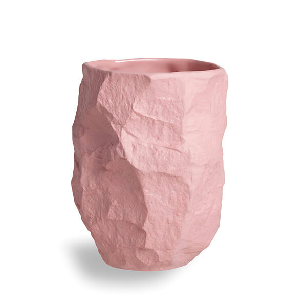 Tall Crockery Pink Vase by 1882 Ltd. with Max Lamb, chipped and crafted with the tools of a stone mason, this piece bounces the shadows off its uneven surface